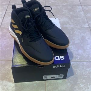 Black and gold adidas ownthegame shoes